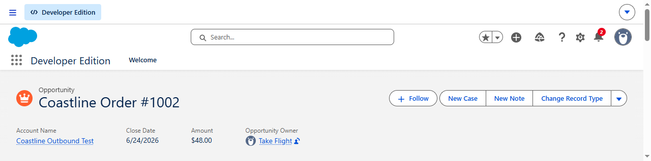 A Salesforce opportunity named Coastline Order #1002 for $48.00, reconciled from the Shopify order